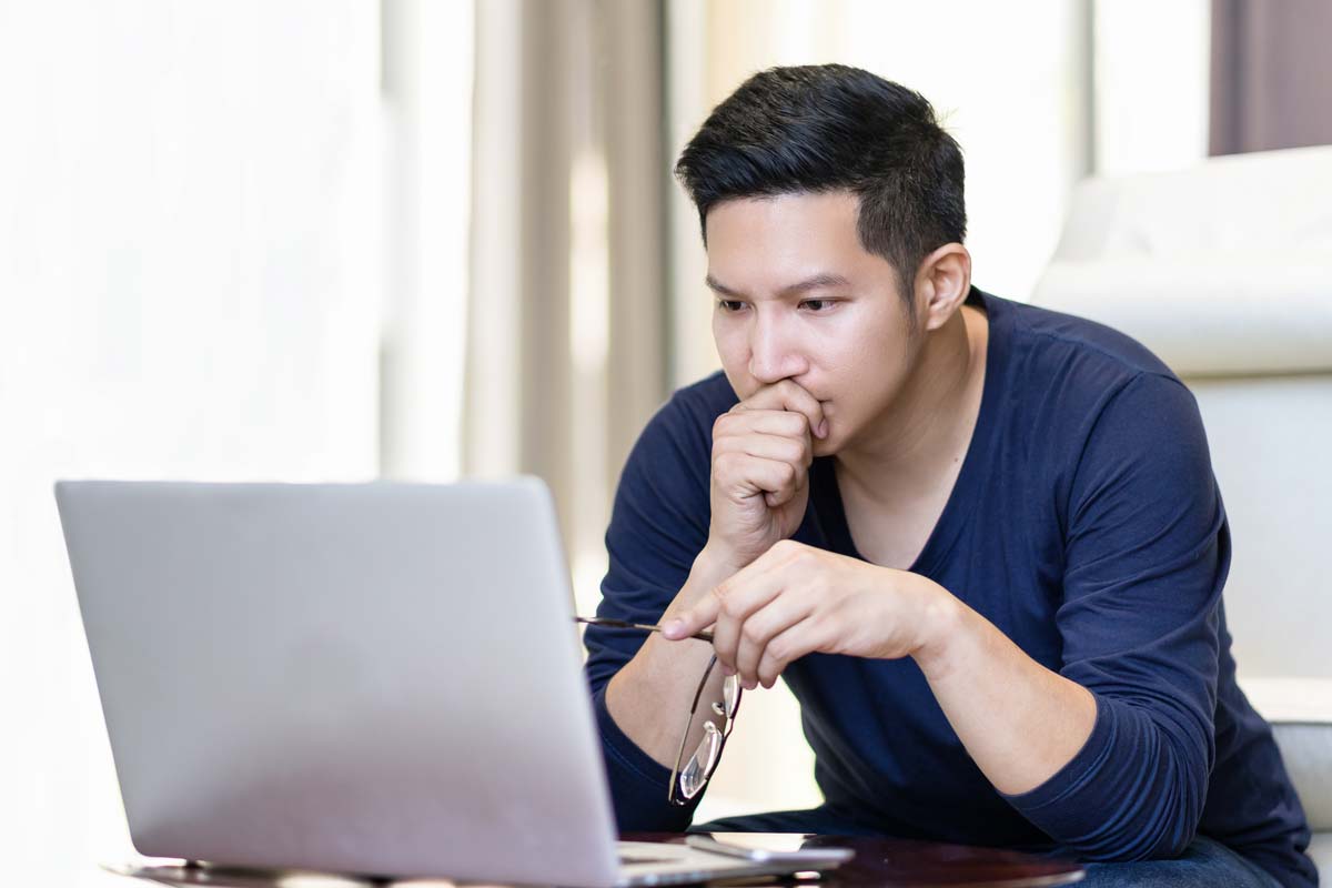 a man on his computer searching what is krokodil