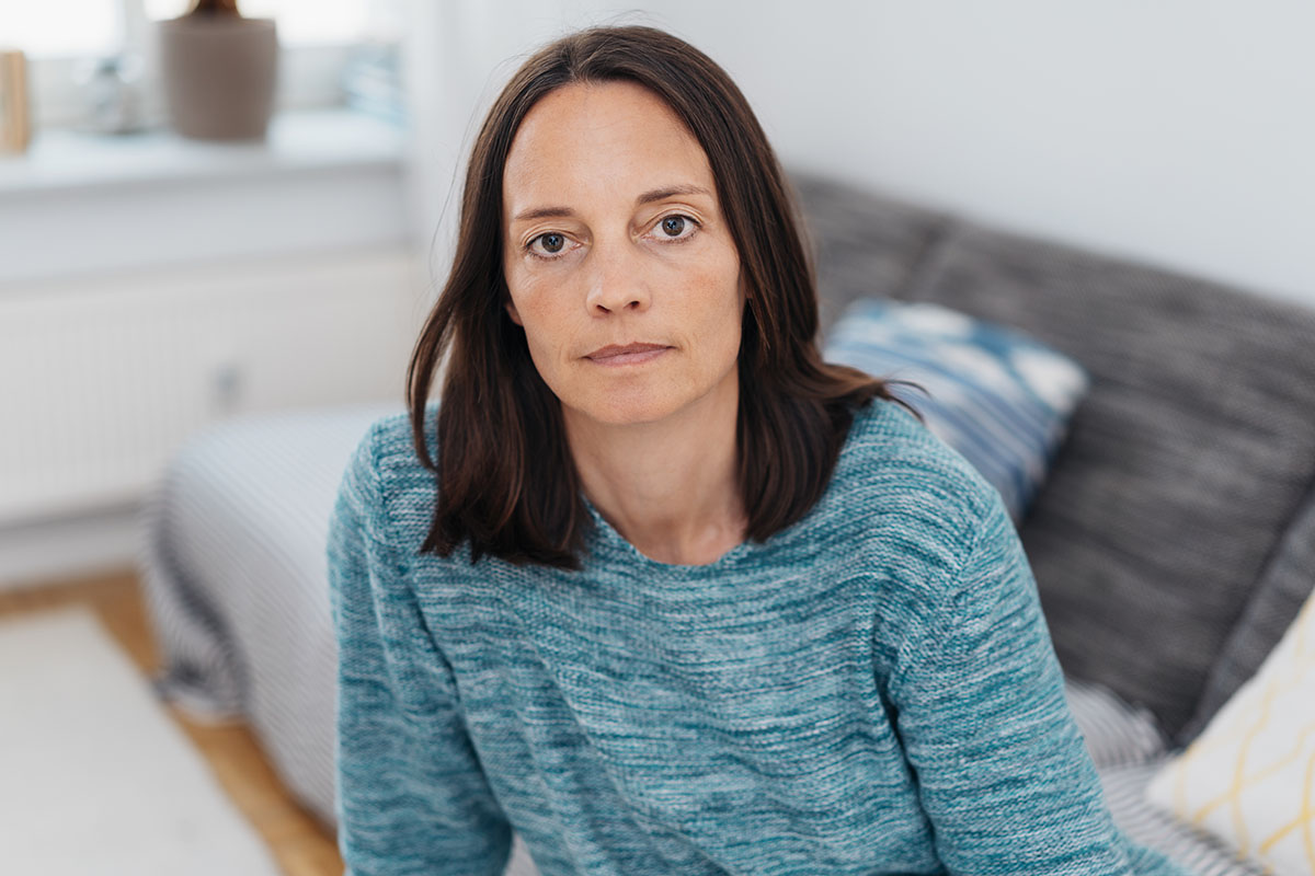 heroin side effects, woman staring at you with blank expression