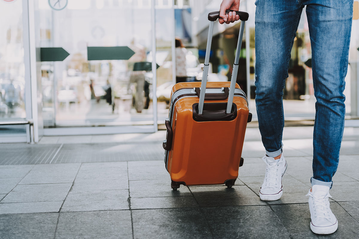 individual going to the airport after choosing an out-of-state residential treatment center