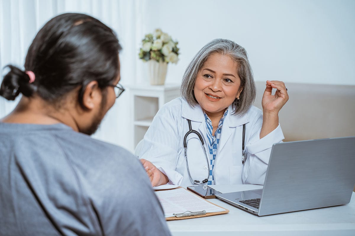 doctor explaining medication assisted treatment