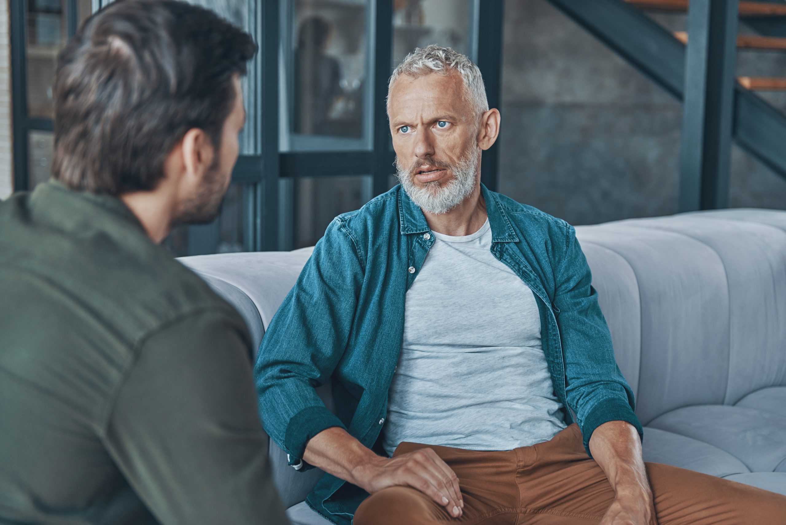 father taking action to help son's substance abuse