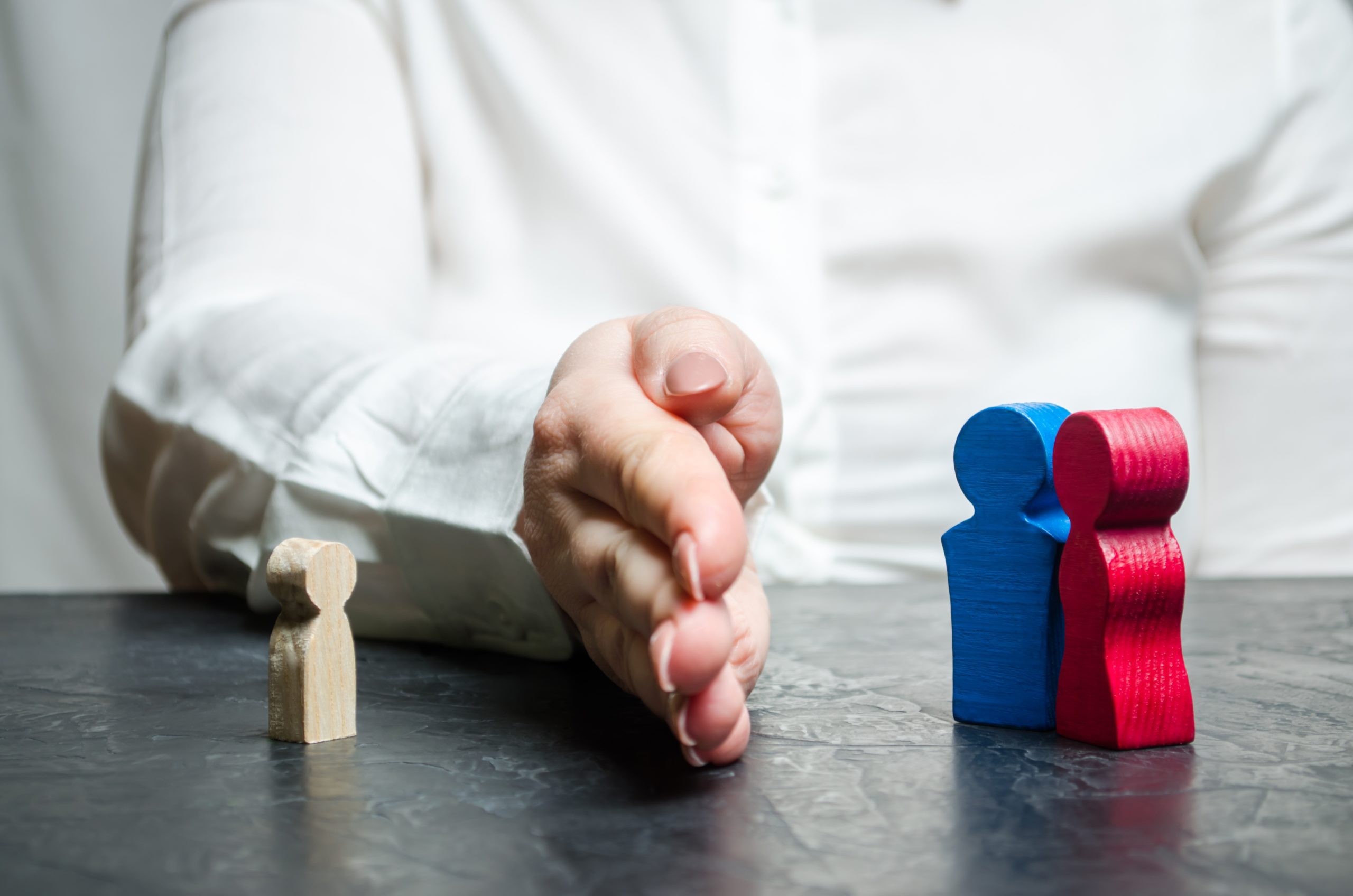 hand separating parents from child representing being an ex-enabler