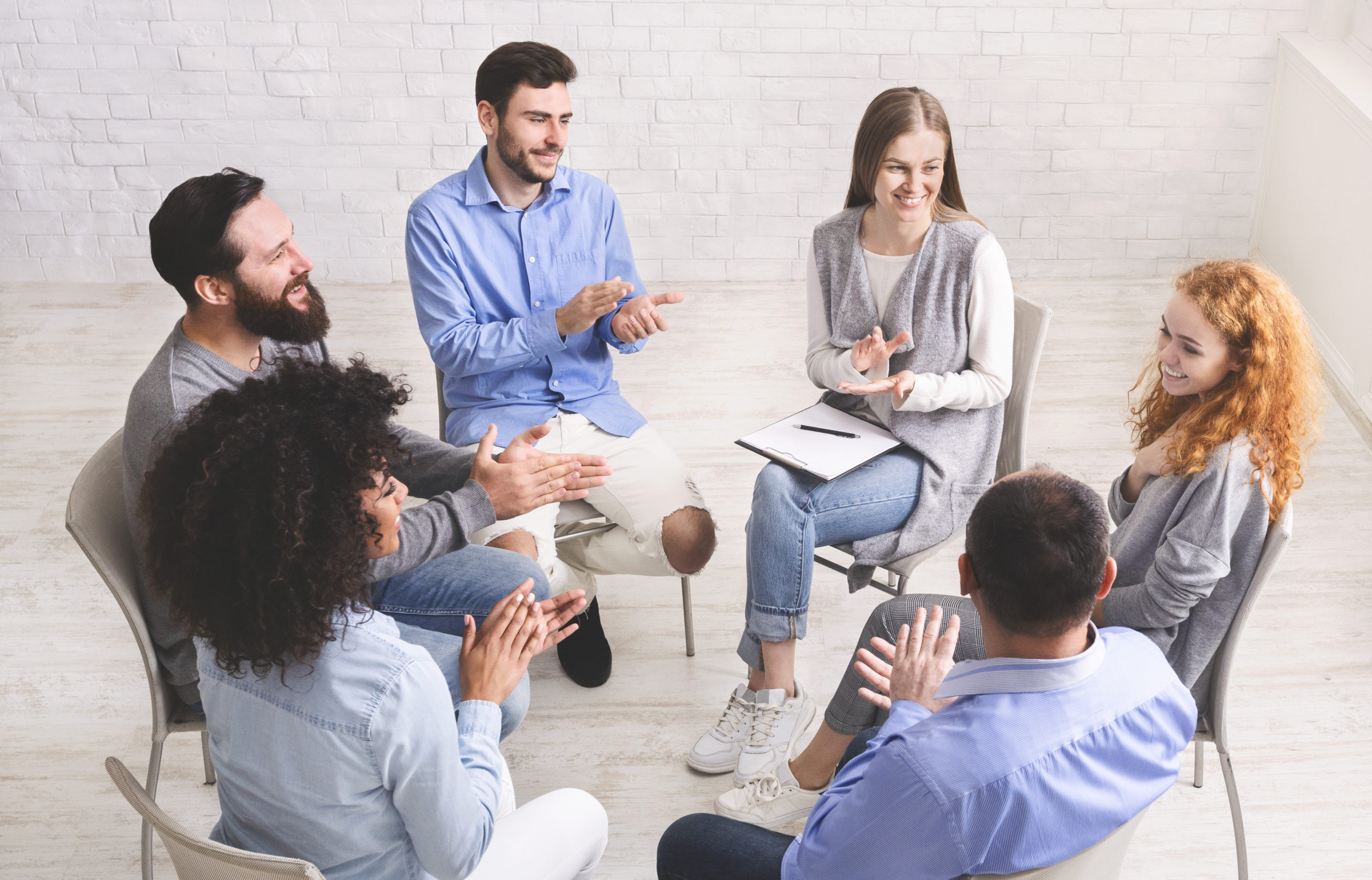 Group therapy led by therapist who loves working with SUD patients